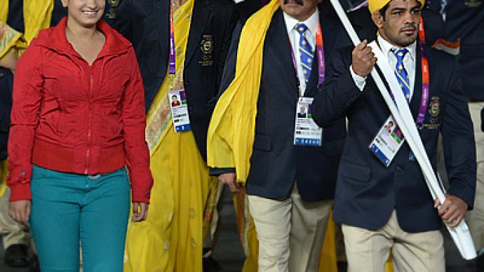 Indian Olympians see red: Gate-crashing girl steals spotlight from athletes (PHOTOS)
