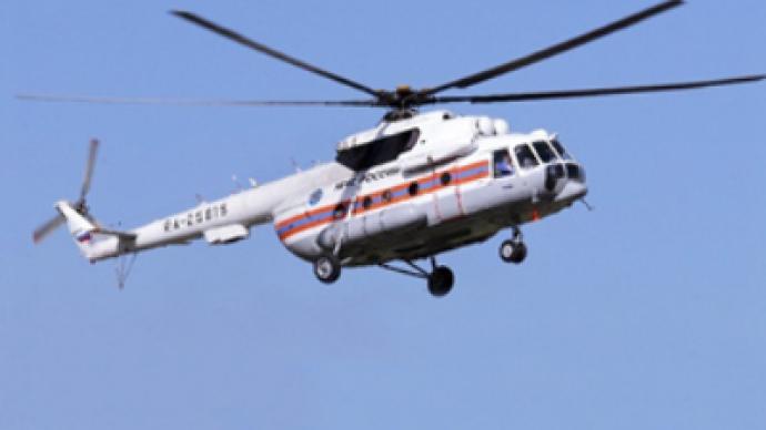 Investigators arrive at the scene of helicopter crash in Altay