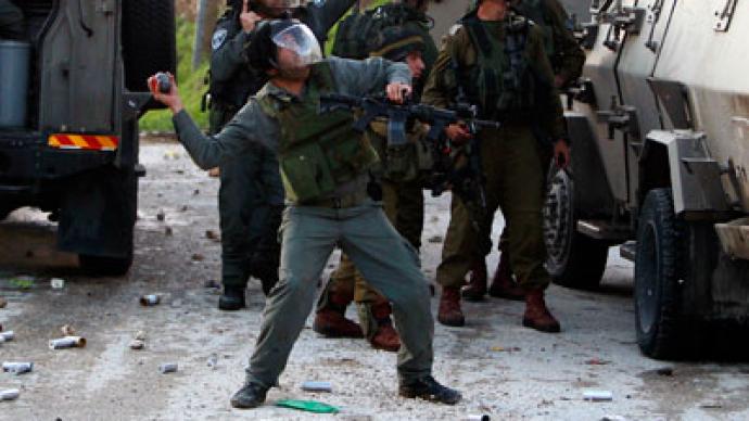 Israeli soldiers use tear gas, stun grenades to evict Palestinian camp