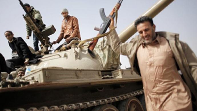 Obama orders Gaddafi to step down, reasons with air force