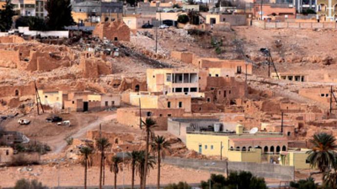 Eleven killed as Libyan militia shell Gaddafi stronghold