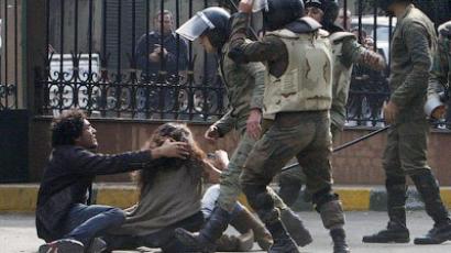 Egyptian police beating ile ilgili görsel sonucu
