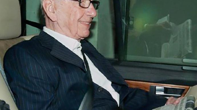 Murdoch’s empire expansion halts as British probe brings more arrests