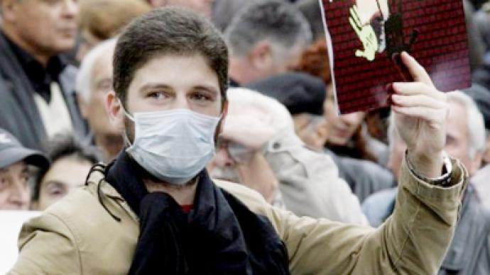 Georgian regime turns on families of opposition