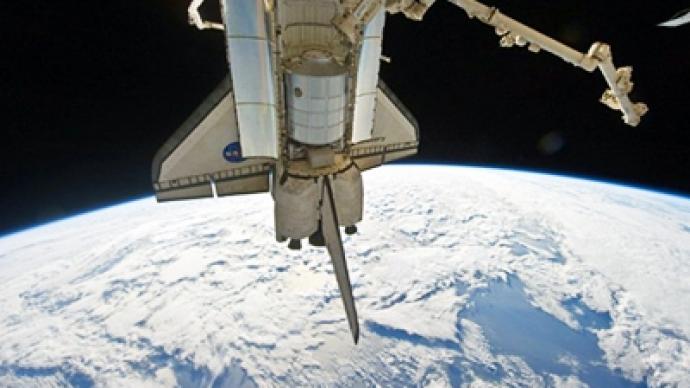Shuttle Discovery’s last docking at the ISS