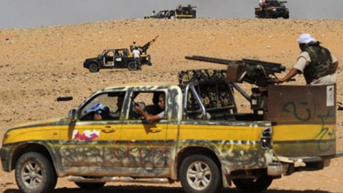 Rebels assault Gaddafi’s hometown