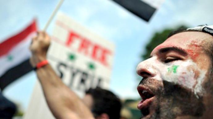 Syria allows political parties