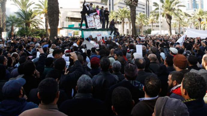 Pro-regime ralliers in Tunisia denounce opposition's planned strike