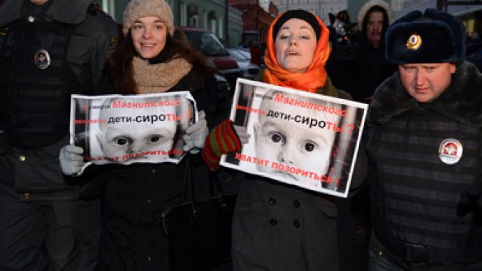 Moscow police break up pickets against US adoptions ban