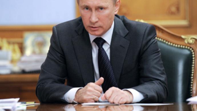 Putin slams 'disgusting' Gaddafi death coverage