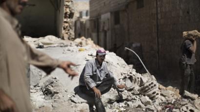 Qatar calls for Arab-led military intervention in Syria