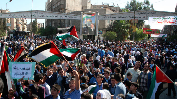 Palestinians living in Syria take part in a protest at al-Yarmouk Camp near Damascus.(Reuters / Khaled al-Hariri)