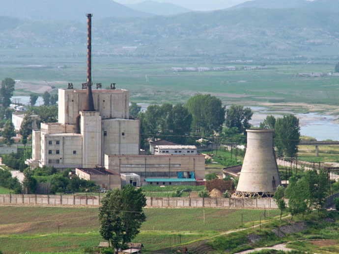 A North Korean nuclear plant is seen before demolishing a cooling tower (R) in Yongbyon, in this photo taken June 27, 2008 and released by Kyodo. North Korea is to restart the mothballed Yongbyon nuclear reactor that has been closed since 2007 in a move that could produce more plutonium for nuclear weapons as well as for domestic electricity production, its KCNA news agency said on April 2, 2013.(Reuters / Kyodo)