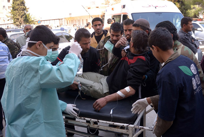 In this image made available by the Syrian News Agency (SANA) on March 19, 2013, a man is brought to a hospital in the Khan al-Assal region in the northern Aleppo province, as Syria's government accused rebel forces of using chemical weapons for the first time. (AFP Photo)