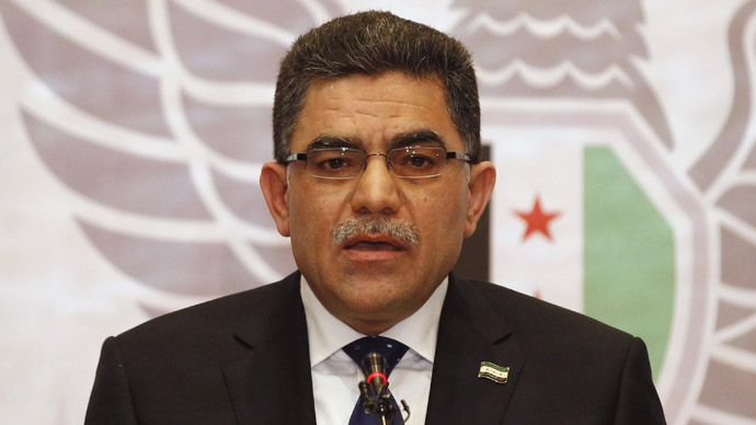 Syria's provisional prime minister Ghassan Hitto attends a news conference in Istanbul March 19, 2013. (Reuters)