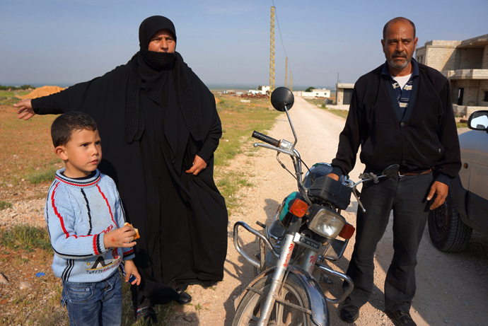 Heâs a Sunni, sheâs a Shiite, they have 5 children. They were driven out of Syria for their faith, in addition to that they were shot at in the morning. (Photo by Nadezhda Kevorkova)