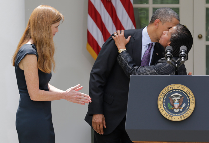 U.S. President Barack Obama kisses Susan Rice after his announcement of Rice's appointment as his National Security Advisor and Samantha Power (L) as U.S. Ambassador to the United Nations, during a statement in the Rose Garden of the White House in Washington, June 5, 2013 (Reuters / Joshua Roberts)