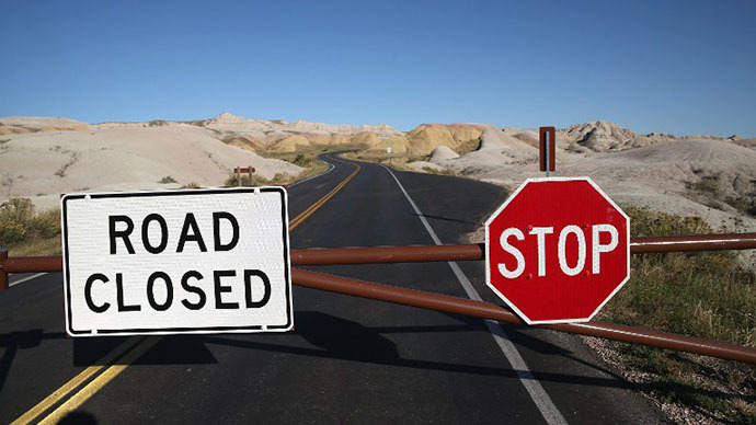 A barricade prevents visitors from entering the interior of the Badlands National Park on October 1, 2013 near Wall, South Dakota. (AFP Photo / Scott Olson)