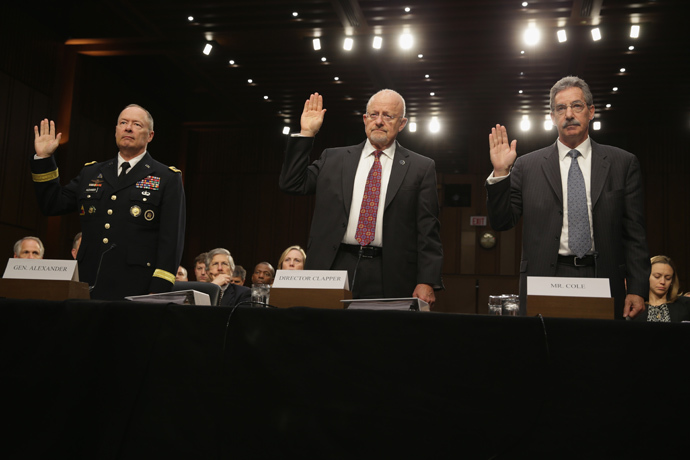 (L-R) National Security Agency Director General Keith Alexander, Director of National Intelligence James Clapper, Deputy Attorney General James Cole are sworn in during a hearing before the Senate (Select) Intelligence Committee September 26,2 103 on Capitol Hill in Washington, DC (Alex Wong / Getty Images / AFP)