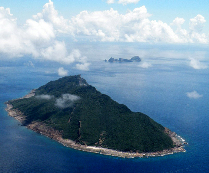 This aerial shot shows the disputed islands known as Senkaku in Japan and Diaoyu in China in the East China Sea. (AFP Photo / JIJI Press Japan out)