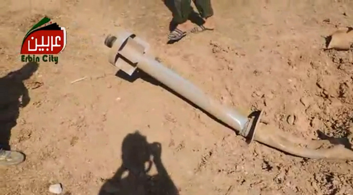 An image grab taken from a video uploaded on August 22, 2013 shows, what rebels claim to be, one of the missiles carrying chemicals that targeted eastern Ghouta, on the outskirts of Damascus. (AFP Photo / Youtube / Arbeen Unified Press Office)