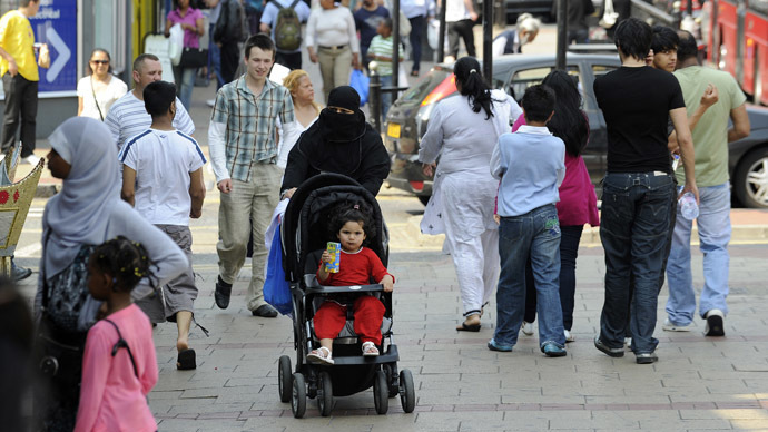 Shoppers walk in a market in Upton Park, a neighborhood in the British capital's most culturally diverse borough of Newham, in east London (Reuters/Paul Hacket)