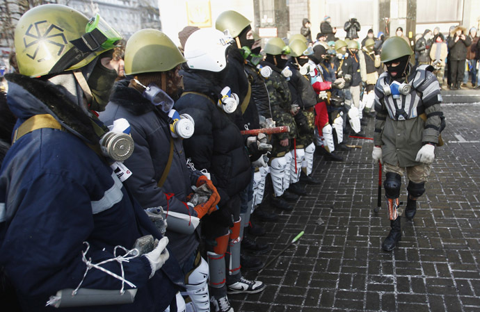 Anti-government protesters from far-right group "Right Sector" train in Independence Square in central Kiev, January 25, 2014. (Reuters)