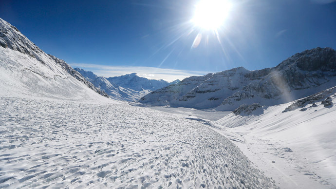 An aerial view of Olivares glacier where a camp of Greenpeace environmental activists is disposed for the symbolic founding of "Republica Glaciar" (Glacier Republic), some 5,000 meters (16,404 ft.) above sea level, at Los Andes Mountain range, near Santiago city, March 2, 2014. (Reuters / Ivan Alvarado )