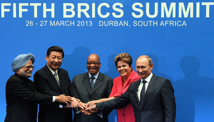 BRICS leaders (From L) India Prime minister Manmohan Singh, President of the Peopleâs Republic of China Xi Jinping, South Africa's President Jacob Zuma, Brazil's President Dilma Rousseff and Russian Federation President Vladimir Putin, pose for a family photo in Durban on March 27, 2013.( AFP Photo / Alexander Joe )