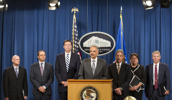 U.S. Attorney General Eric Holder speaks at a news conference after the French bank BNP Paribas plead guilty to a criminal charge in connection with its violations of U.S. sanctions on Sudan and other countries in Washington on June 30, 2014. (Reuters)