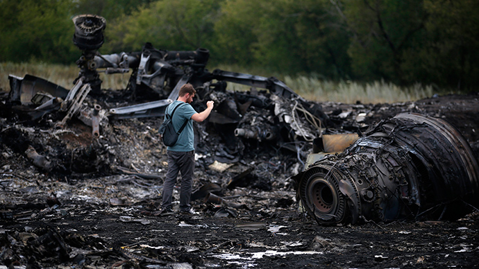 Why was MH17 flying through a war zone where 10 aircraft have been shot down?