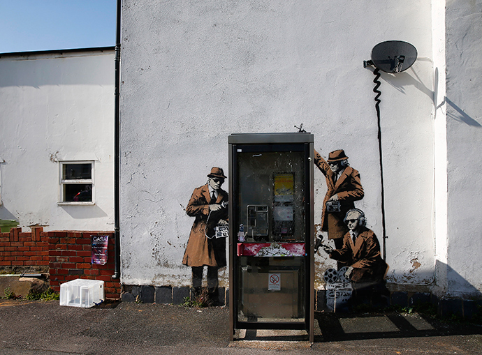 Graffiti art is seen on a wall near the headquarters of Britain's eavesdropping agency, Government Communications Headquarters, known as GCHQ, in Cheltenham, western England (Reuters / Eddie Keogh)