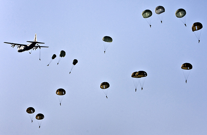 Parachutes are being dropped at Ginkel Heath in Ede, the Netherlands, on September 19, 2009. The activity is organised to mark the 65th anniversary of the Battle of Arnhem which was fought in and around the city of Arnhem from the 17â26 September 1944 (AFP Photo)