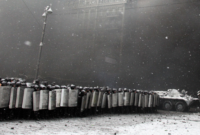 A file picture taken on January 22, 2014 shows riot police facing protestors during clashes in the center of Kiev. (AFP Photo / Anatoliy Stepanov)