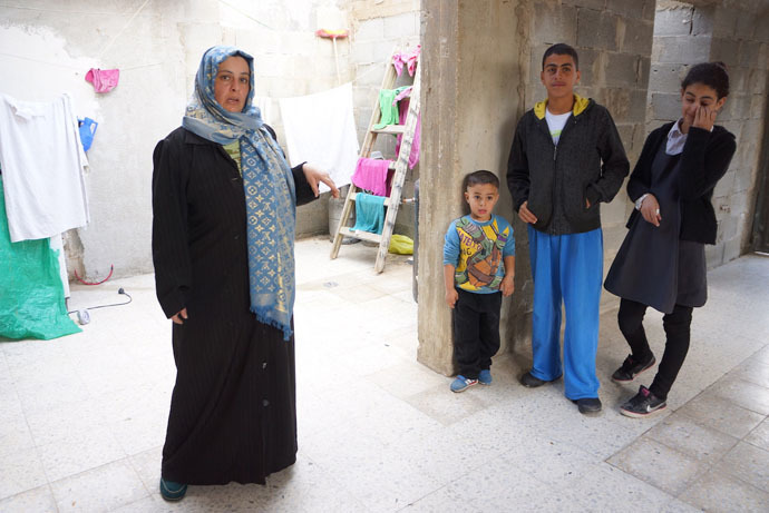 The authorities come in every day to check whether the family repaired the roof â the town council banned them to put on a roof. (Photo by Nadezhda Kevorkova)