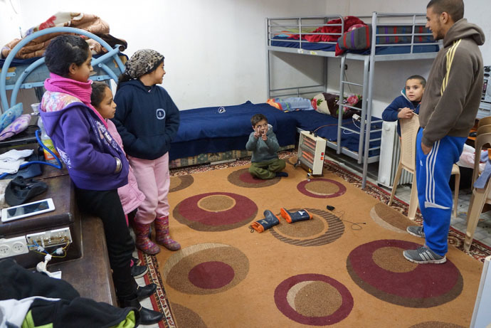 The childrenâs room in the makeshift home can be demolished any minute without notice (Photo by Nadezhda Kevorkova)
