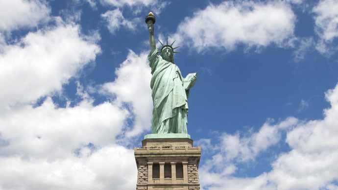 Sitting on the wrong side of history, Liberty's flame burns east