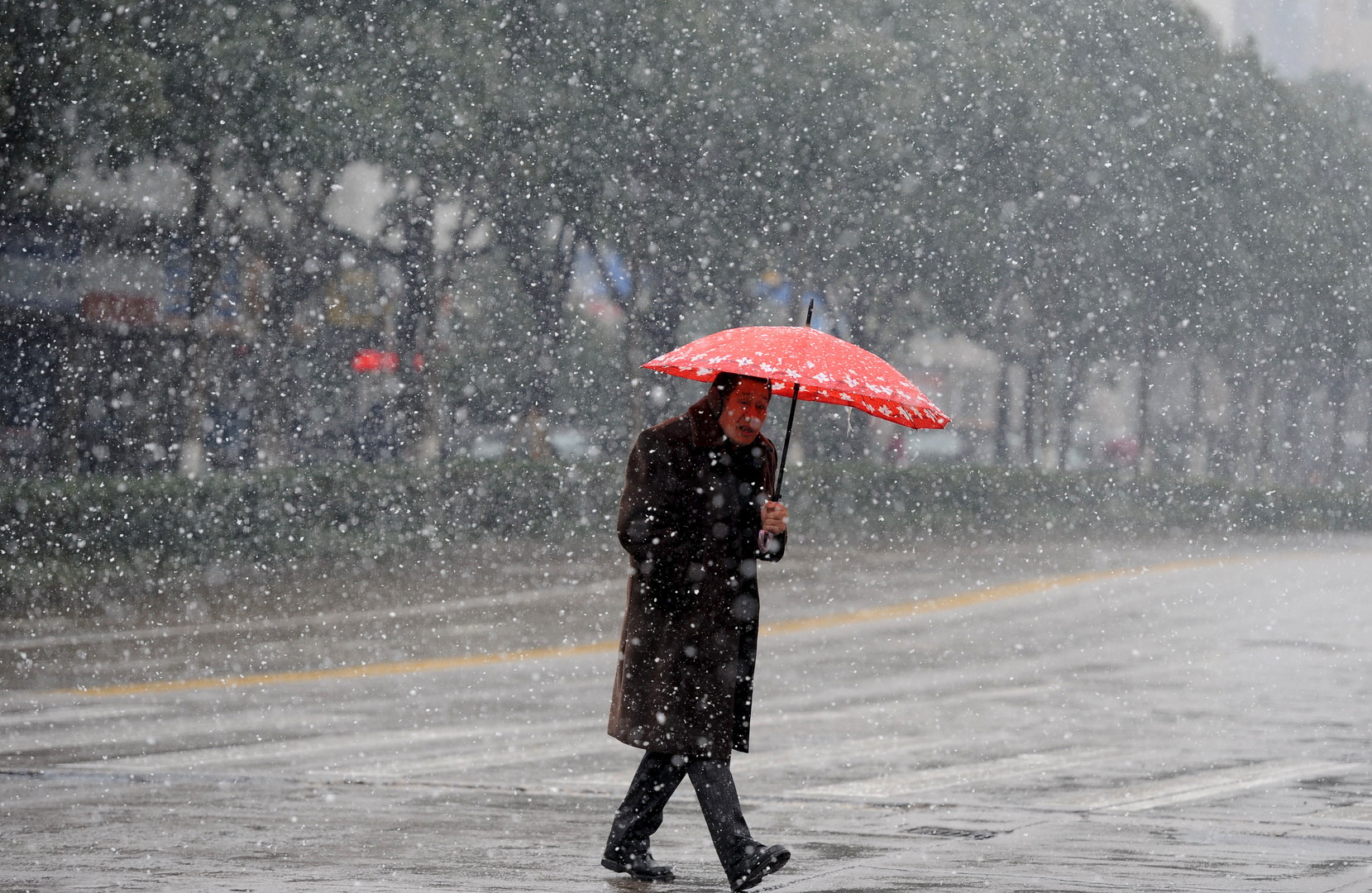 Tempêtes et froid intense sur la côte est des Etats-Unis et en Chine (PHOTOS)