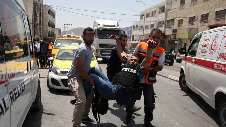 Un colon israélien tue un palestinien et blesse un photographe d'Associated Press