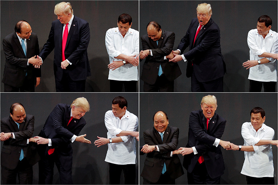 Trump et Medvedev troublent la traditionnelle photo de famille de l'Asean à Manille (IMAGES)