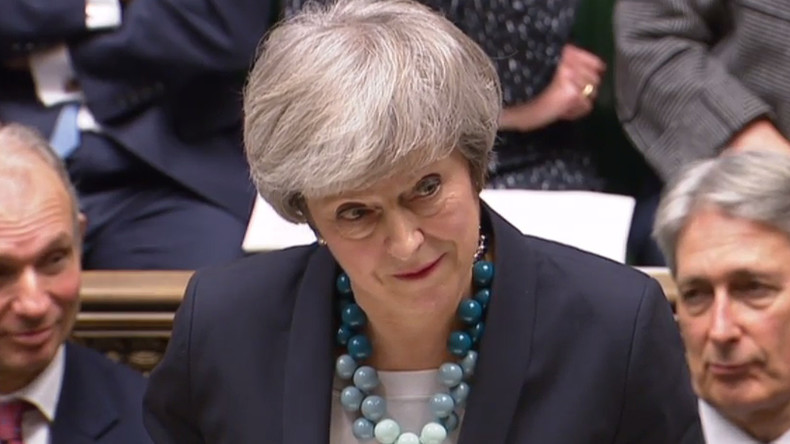 Theresa May annonce au parlement le report du vote sur l'accord de Brexit