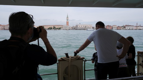 Les touristes de retour à Venise (illustration).