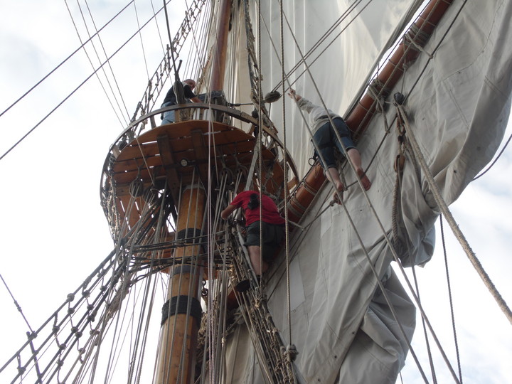 tall ships in battle reenactment