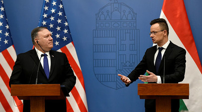 Глава МИД Венгрии Петер Сийярто и госсекретарь США Майк Помпео 