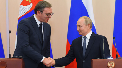 Президент России Владимир Путин с лидером Сербии Александром Вучичем