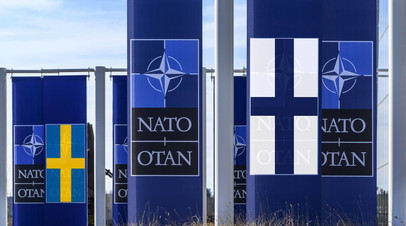 Символика НАТО и флаги Финляндии и Швеции