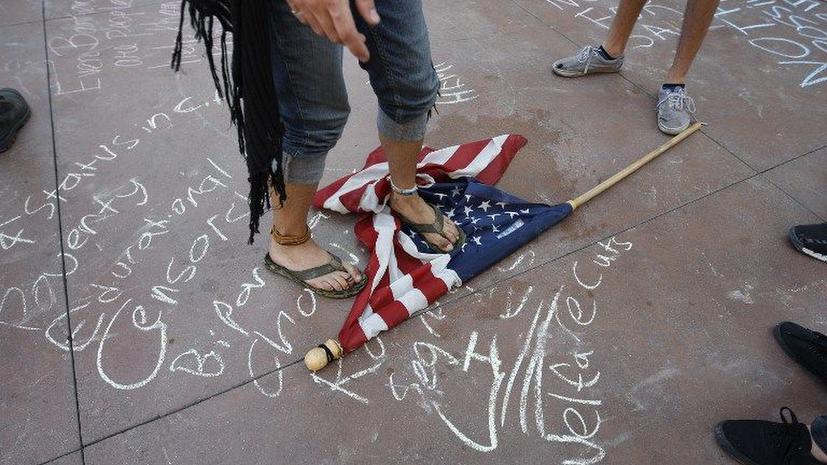 Присяжные в США оправдали участника движения Occupy, обвинявшегося в избиении полицейского